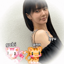 a woman with the names gabi ann and gyu on her chest
