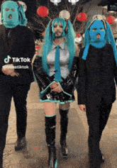 a group of people wearing ski masks with tiktok written at the bottom