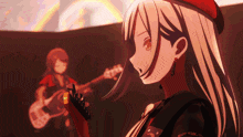 a girl in a red hat is holding a guitar in front of another girl playing a guitar