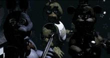 chica from five nights at freddy 's is standing between bonnie and fredbear