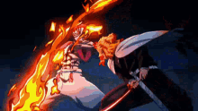 two anime characters are fighting each other with swords and fire coming out of their mouths .