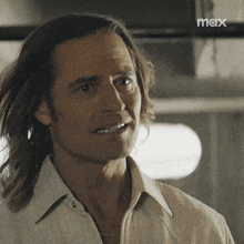 a close up of a man 's face with the word max in the corner