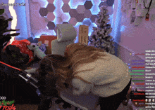 a woman laying on a chair in front of a christmas tree with the words sweet talk on the bottom left