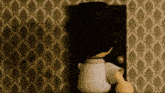 a cartoon character standing in front of a door with a patterned wall behind him