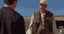 a man wearing a hat that says hautee on it