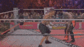 a man in a boxing ring with a sign that says eatest draft eve