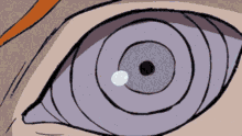 a close up of a cartoon character 's face with a swirling eye .