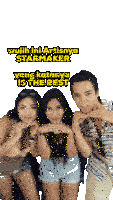 a man and two women posing for a picture with the caption " wujih ini artisnya starmaker "