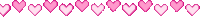 a row of pink hearts are lined up in a row on a white background