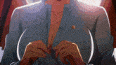 a close up of a woman 's breasts in a blue shirt