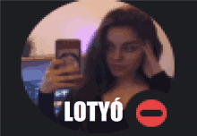 a blurred image of a woman taking a selfie with the word lotyo in white letters