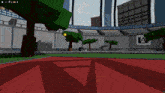 a computer screen shows a stadium with trees and a sign that says ia
