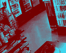 a red and blue photo of a store aisle with a display of doritos