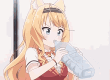 a girl with a cat ear is drinking from a plastic bottle