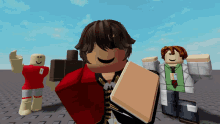a man in a red jacket is holding a box in his hand