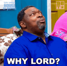 a man in a blue shirt says why lord