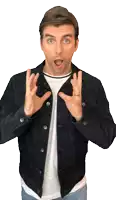 a man wearing a denim jacket is making a surprised gesture