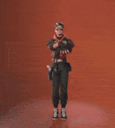a man with a skull on his jacket is dancing
