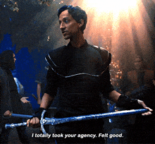 a man holding a sword with the words " i totally took your agency felt good "