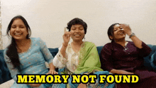 three women sitting on a couch with the words memory not found