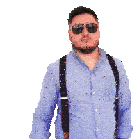 a man wearing suspenders and sunglasses is pointing his finger
