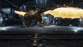 a large dragon is standing in a dark room with a yellow light behind it
