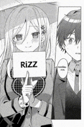 a girl holding a sign that says rizz next to a boy
