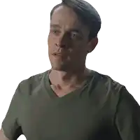 a man with his eyes closed and a green shirt on