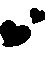 two black hearts are flying in the air on a white background .