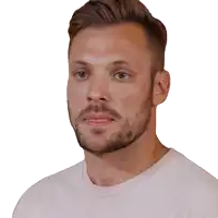 a man with a beard is wearing a pink shirt