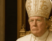 a close up of a man wearing a bishop 's hat