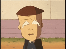 a cartoon character with a tear running down his eye