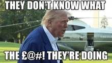 donald trump is standing in front of a united states helicopter