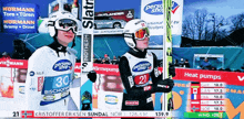 two skiers are standing in front of a sign that says personal shop on it