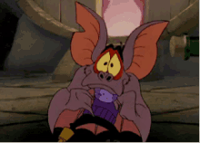 a cartoon character with big ears is holding a purple object in his mouth