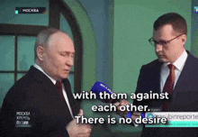 a man in a suit and tie is talking to another man with the words with them against each other there is no desire below him