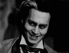 Johnny Depp Evil Smile GIF - Johnny Depp Evil Smile Sweeney Todd The Demon Barber Of Fleet Street GIFs