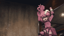 a girl in a pink uniform is holding a gun