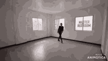 a man is standing in an empty room with the words master bedroom on the windows