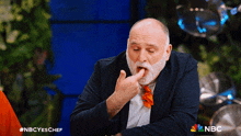 a man with a beard is on nbc 's yes chef show