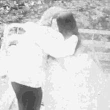 Hugging Yoko Ono GIF - Hugging Yoko Ono John Lennon GIFs