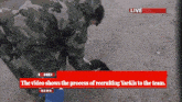 a tv screen shows a man in a camouflage uniform and the words " the video shows the process of recruiting yarkis to the team "