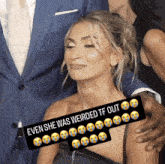 a woman with her eyes closed has a sticker that says even she was weirded tf out
