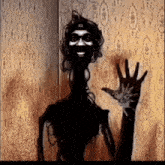a silhouette of a woman with the letter o on her head waving
