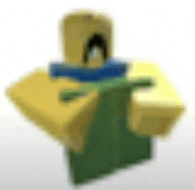 a blurred image of a yellow and green toy with a penguin on his head .