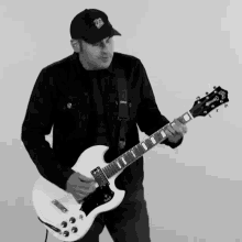 playing guitar mark mcmillon hawthorne heights tired and alone song strumming the guitar