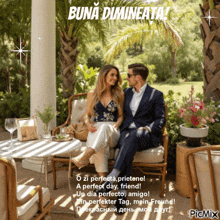 a picture of a man and a woman sitting on a couch with a buna dimineata message