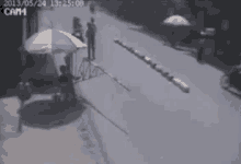 a person riding a motorcycle on a street with a cam4 watermark on the bottom