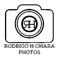 a logo for rodrigo h ohara photos with a camera in the middle