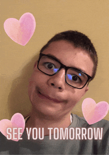 a boy wearing glasses is surrounded by pink hearts and the words " see you tomorrow "